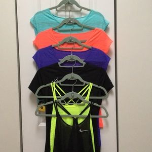 Variety of Nike Cool Breeze workout tops
